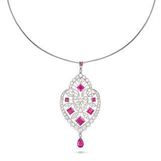 A SPINEL AND DIAMOND PENDANT NECKLACE in platinum and 18ct white gold, in an open work design set...