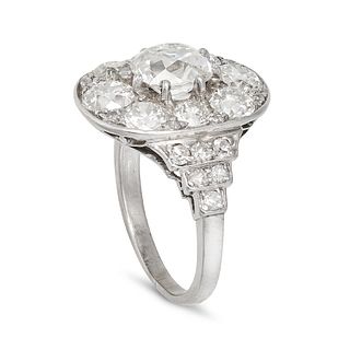 A FINE OLD CUT DIAMOND CLUSTER RING in platinum, set with an old cut diamond of approximately 1.1...