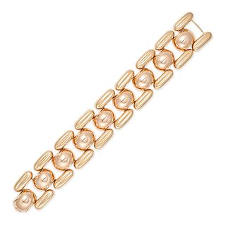A RETRO GOLD BRACELET in 18ct yellow gold, comprising a row of fancy links, marked indistinctly, ...