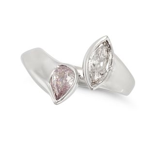 A PINK AND WHITE DIAMOND CROSSOVER RING in platinum, the open band set with a pear cut pink diamo...