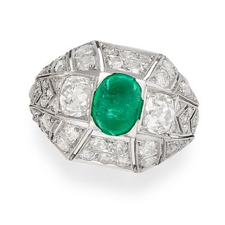 A VINTAGE EMERALD AND DIAMOND DRESS RING, 1940S in platinum, the bombe face set with an oval cabo...