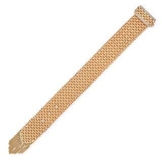A RETRO FRENCH DIAMOND BELT BRACELET in 18ct yellow gold and silver, designed as a woven belt ter...