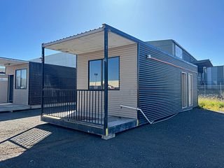 Unreserved - 10.8m x 3.4m Transportable building with front porch