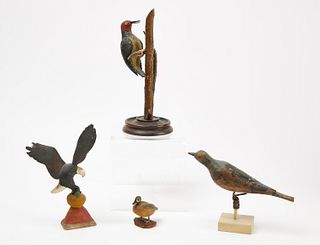 Four Carved and Painted Birds.