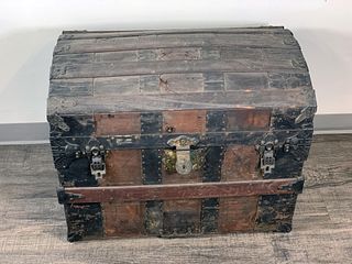 ANTIQUE DOME TOP TRUNK WITH ORIGINAL STOCKINGS