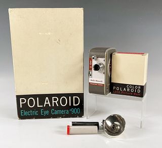 BELL & HOWELL 8MM MAGAZINE CAMERA IN POLAROID BOX WITH FILM