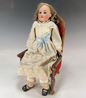 ANTIQUE GERMAN DOLL ON CHAIR