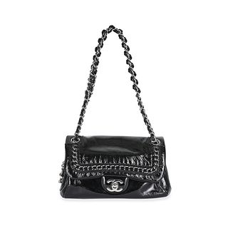 CHANEL PATENT CHAIN SHOULDER BAG Condition grade B-. Produced between 2006 and 2008. 23cm long,...