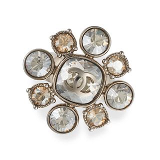CHANEL, A RHINESTONE CLUSTER RING, with yellow toned and clear rhinestones, interlocking CC detai...