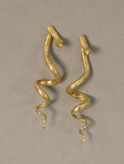 Pair of 14K gold snake earrings. 10 grams
