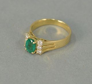 Emerald and 14K gold ring.
