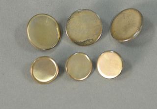 Set of Cartier sterling buttons with box.