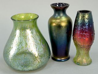 Three art glass vases attributed to Loetz, ht. 5in. to 5 1/4in.