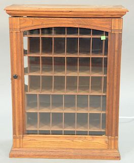 Victorian one door cabinet with pigeon holes. ht. 30in., wd. 23in.