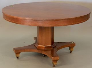 Round mahogany pedestal dining table with four leaves, dia. 54in., opens to 97in.