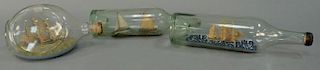 Three antique ship in a bottle displays. lg. 10 1/2in., 12in., & 8 1/2in.