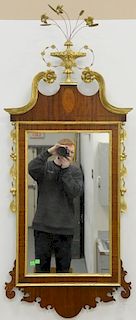 Margolis mahogany Federal style inlaid mirror with gilt urn and pediment top, signed Margolis on reverse. 24" x 57"