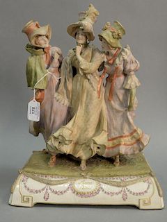 Amphora triple figural group "Anno 1800" having three women in Victorian dresses marked Amphora 1346. ht. 16in., lg. 12in.