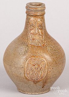 Small German stoneware bellarmine jug, 17th c.