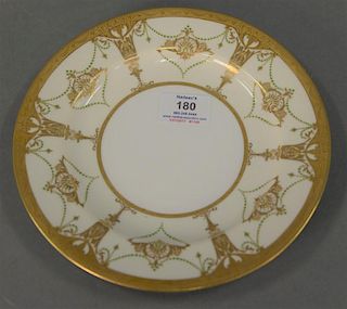 Set of seven Royal Worcester service plates with heavy gilt decoration. dia. 9in.
