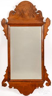 Bench made Chippendale style walnut mirror