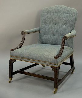 George II mahogany armchair with added brass feet.