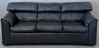 Navy blue three cushion sofa. lg. 78in.