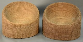 Pair of round wicker bean bag style chairs.