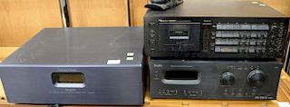 Three piece group to include Sunfire TGP-5 preamplifier surround Theater Grand Processor, Nakamichi cassette deck, and Cinema