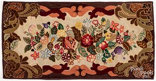 Floral hooked rug, early 20th c.