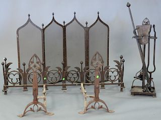 Iron gothic style andirons, tools, and screen. log ht. 25in., screen: ht. 35 1/2in., wd. 51in.