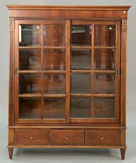 Ethan Allen cherry bookcase with two glass sliding doors. ht. 65in., wd. 50in., dp. 17in.
