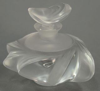Lalique Samoa crystal perfume bottle, frosted and clear glass in swirl design marked Lalique France on bottom. ht. 3 1/2in.