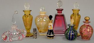Tray lot with nine art glass perfume bottles to include Moser, Czechoslovakian enameled perfumes, etc. ht. 1 5/8in. to 6in.