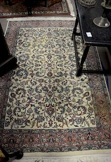 Two Oriental throw rugs, 4' x 5'10" and 2'6" x 6'.
