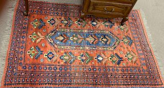 Two Oriental throw rugs, 4'9" x 5'7" and 3'4" x 5'.