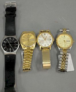 Four mans wristwatches including Omega and Skagen.