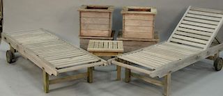 Seven piece lot to include four teak planters, two lounges (lg. 77in.), and small table.