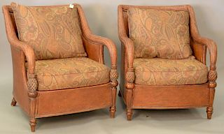 Pair of Ethan Allen woven armchairs with upholstered cushions, one small break in back of one chair behind cushion.