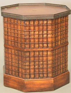 Octagon faux book liquor stand with gallery and leather top. ht. 27in., dia. 24in.
