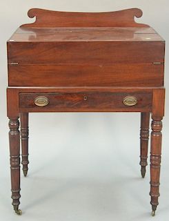 Federal mahogany desk on stand with fold out writing surface and one drawer, circa 1830. ht. 39in., wd. 30in., dp. 18in.