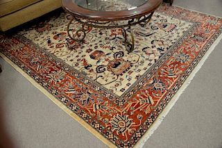 Oriental tan and red room size carpet (staining) 8 x 9.