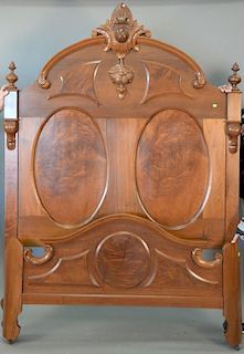 Victorian marble top drop well chest with mirrored back and burl paneled drawer fronts and a large walnut Victorian bed with 
