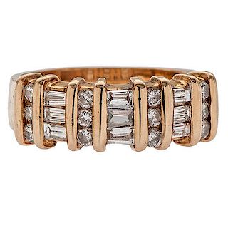 Ring with Round and Baguette Diamonds in 14 Karat 