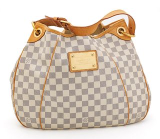 Louis Vuitton (French, B. 1854) Cruise Collection Leather Purse Ca. 2012, H 12'' W 15'' Depth 7''