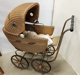 WICKER DOLL CARRIAGE W/PAINTED COMPOSITE DOLL