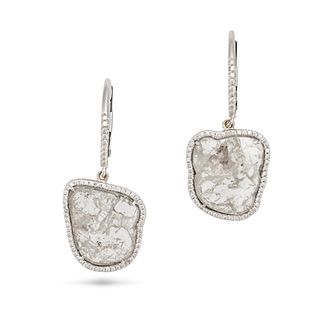 A PAIR OF DIAMOND SLICE EARRINGS in 14ct white gold, each comprising a huggie hoop set with round...