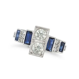 A DIAMOND AND SAPPHIRE DRESS RING in 18ct white gold, set with two round brilliant cut diamonds a...