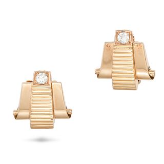 A PAIR OF RETRO DIAMOND EARRINGS in rose gold, each in a scrolling fluted design andÂ set with an ...