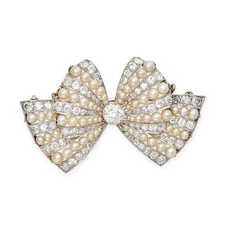 A DIAMOND AND PEARL BOW BROOCH, 1930S in platinum, set to the centre with an old cut diamond of a...